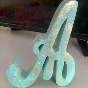 Decor in form of an A in wood